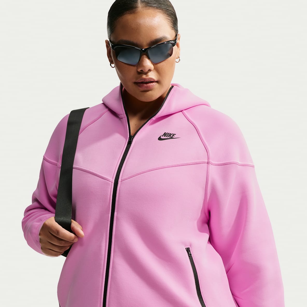 Pink Nike Tech Fleece. Nike.com